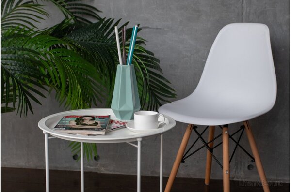 Comfortable chair near a bright window